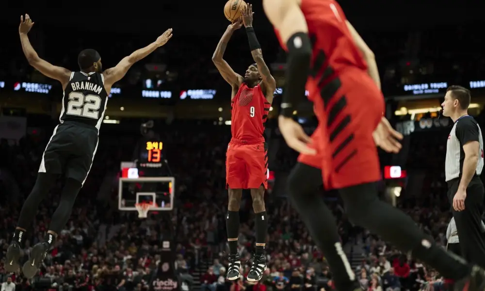 24984138 The Portland Trail Blazers held off the Phoenix Suns in overtime, securing a 121-119 victory at the Moda Center on Monday night.